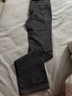 Athleta Charcoal Gray Flare Athletic Leggings with Subtle Gold Stitching